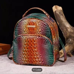 NIB faux rainbow snakeskin backpack